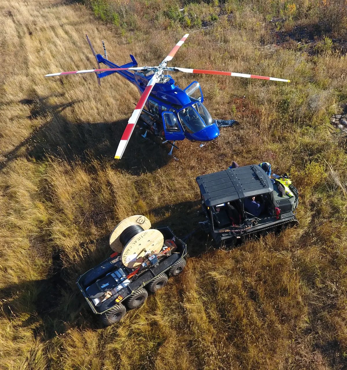 Mackenzie Valley Fiber Link helicopter and tracked vehicle cable haul — TERRESTRIAL SUBMARINE CABLE INSTALLATION TO THE ARCTIC OCEAN